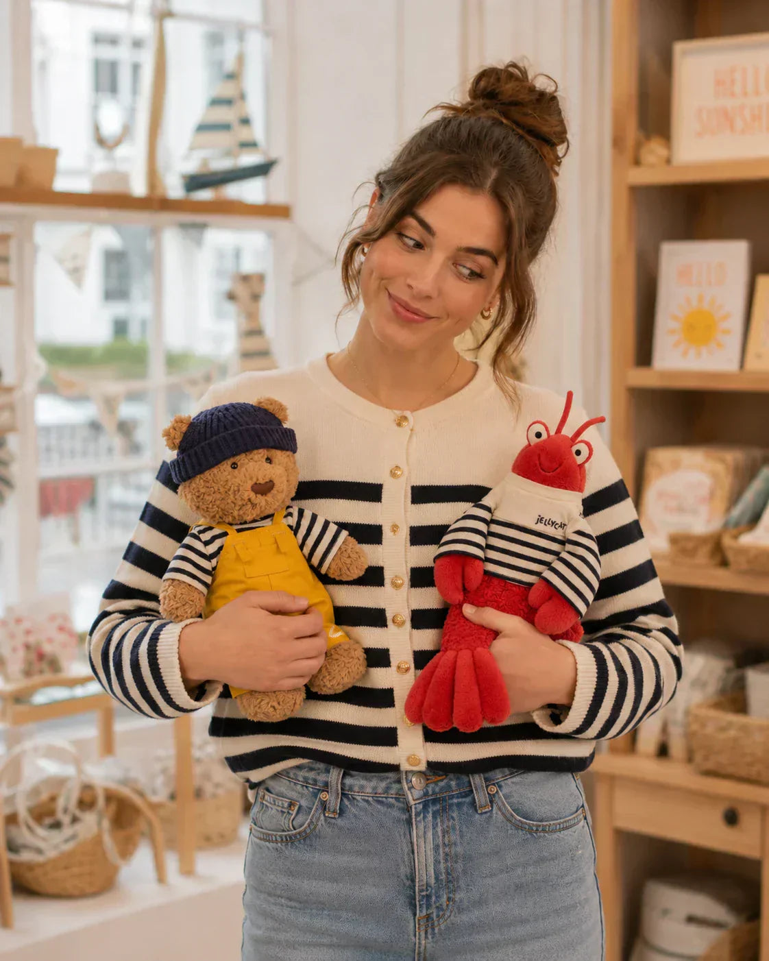 A women can't decide which Jellycat she loves the most.