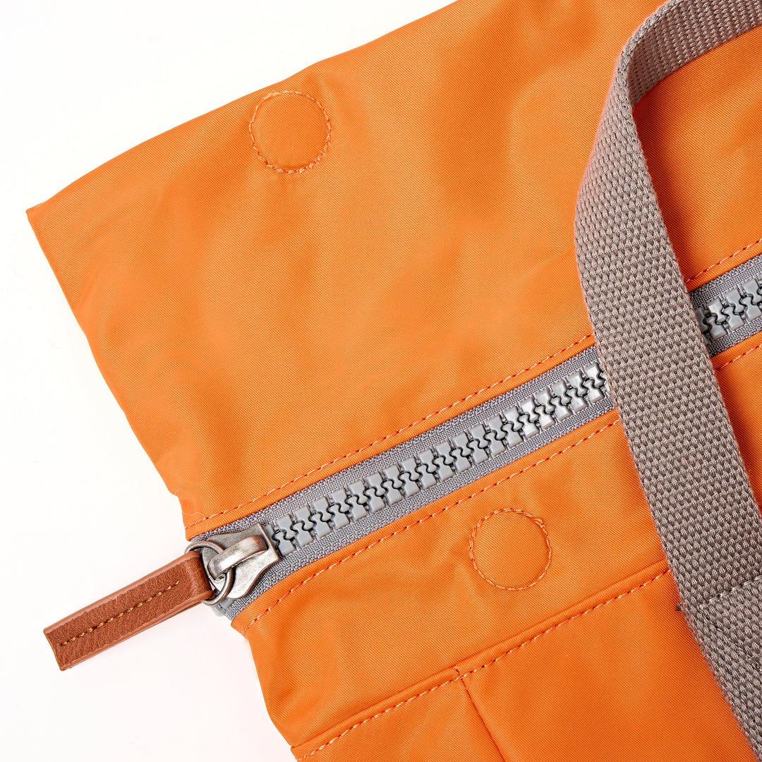 Roka Canfield Small Backpack in Jaffa Orange Nylon